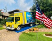 Bradbury Brothers truck in front of home